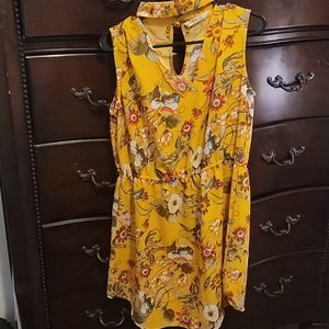 Yellow sleeveless floral dress